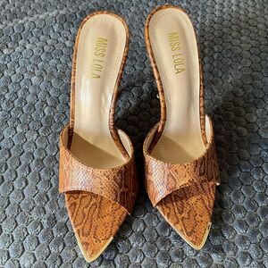 Miss Lola animal print mule heels. Size 7. NWOT
